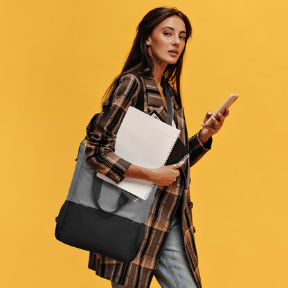 Woman holding a bag, phone, and books against a yellow background