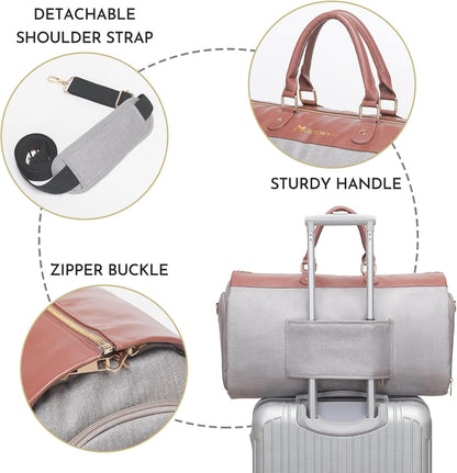 Duffel bag with detachable shoulder strap, sturdy handle, and zipper buckle on a white background.