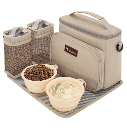 Pet travel set with food containers, bowls, and a cooler bag on a white background